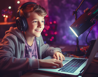 boy_smiling_computer_earphones_light.png