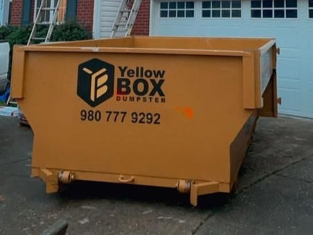 YELLOW BOX DUMPSTER