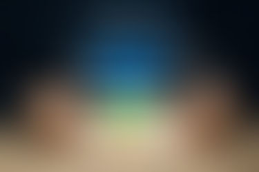 Person holding a phone displaying a colorful marketing funnel illustrating stages of a full-funnel SEO and paid media strategy