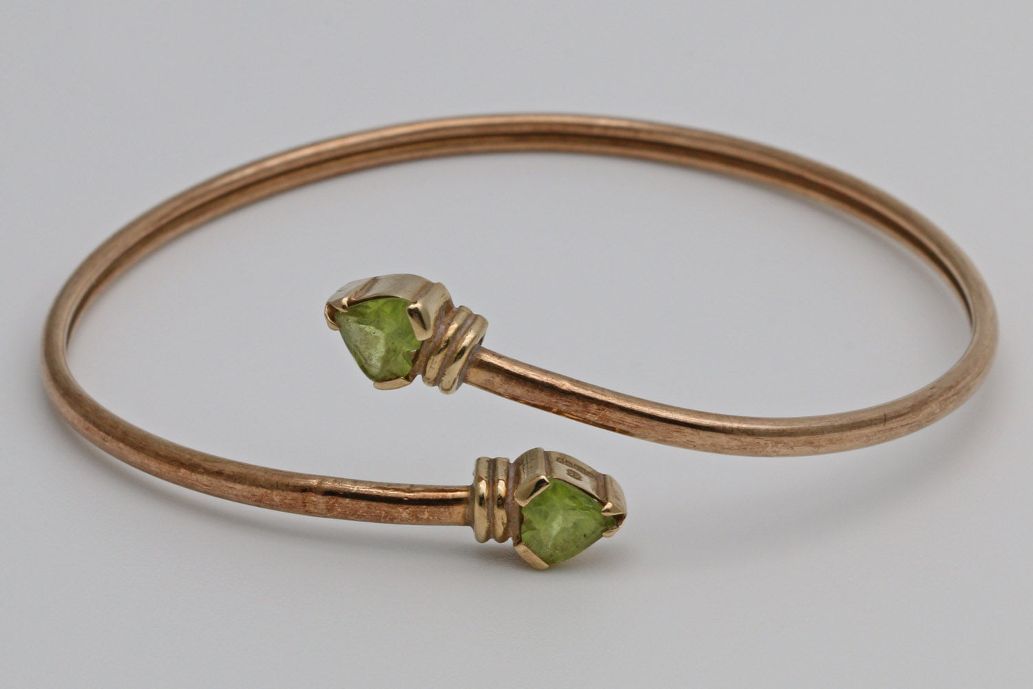 9ct gold bangle with peridots