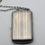 Thumbnail: 1920s Art Deco minaudiere in silver with gold stripes.