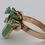 Thumbnail: Unusual Mid-century emerald and nephrite dress ring in 18ct gold