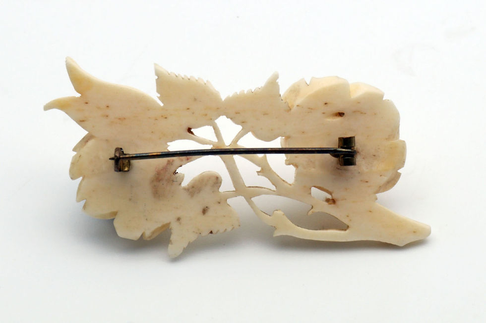 Thumbnail: Ivory brooch of roses