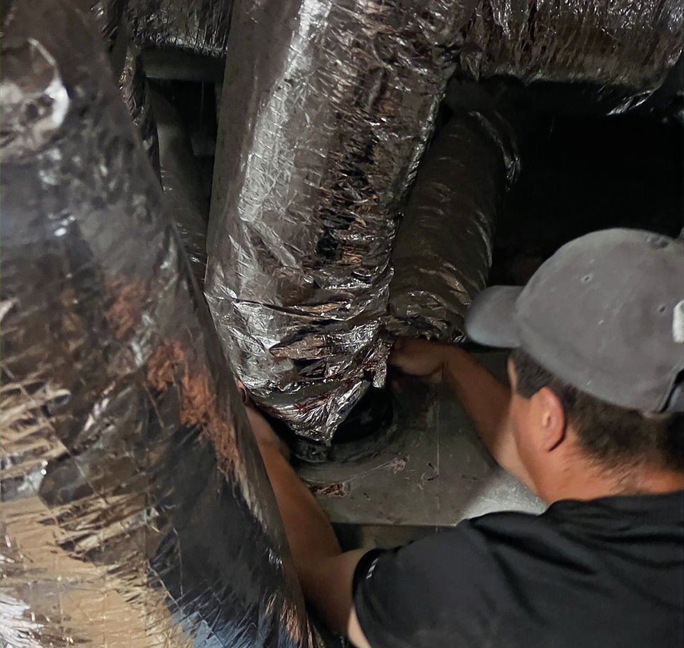 Supreme Duct Cleaners air duct inspector is checking air ducts for leaks in a residential property in Houston, TX.
