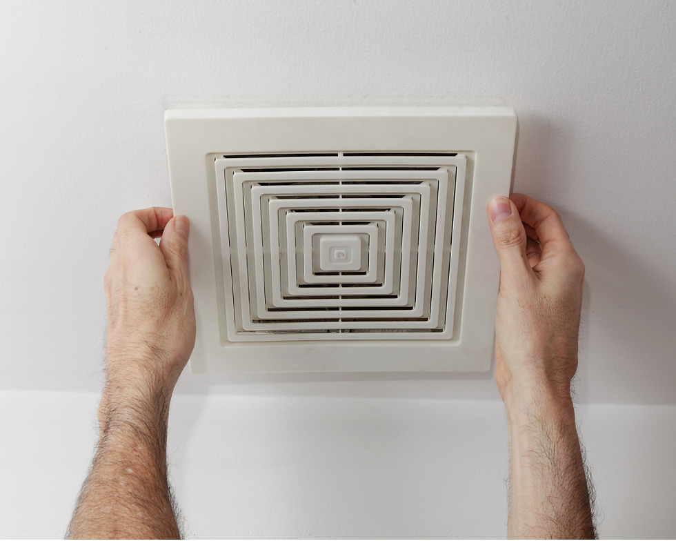 air duct cleaning expert examinating the house air vents.