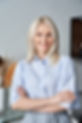 Smiling confident stylish 50s middle aged woman standing at home office. Older businesswom