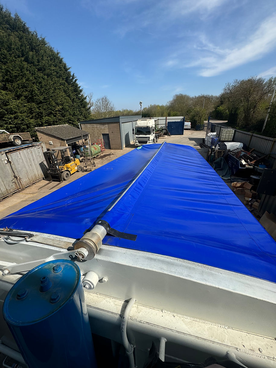  Full truck sheeting systems showing lorry sheet installation on rigid trailers.