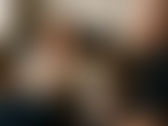 Jon from BetterDog taking notes during in-home dog training session in Ottawa, speaking with attentive dog owner