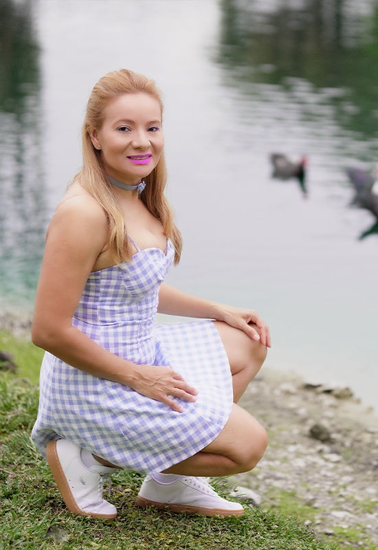Thumbnail: Casual and elegant mini dress with plaid design and flattering sweetheart neckline