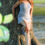 Thumbnail: Model Wearing Navy Blossom Spaghetti Strap Dress Womens Fashion Chic Runway.