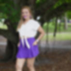 Chic purple cargo mini skirt with stretch fit styled for a casual park outfit by Violet Moda