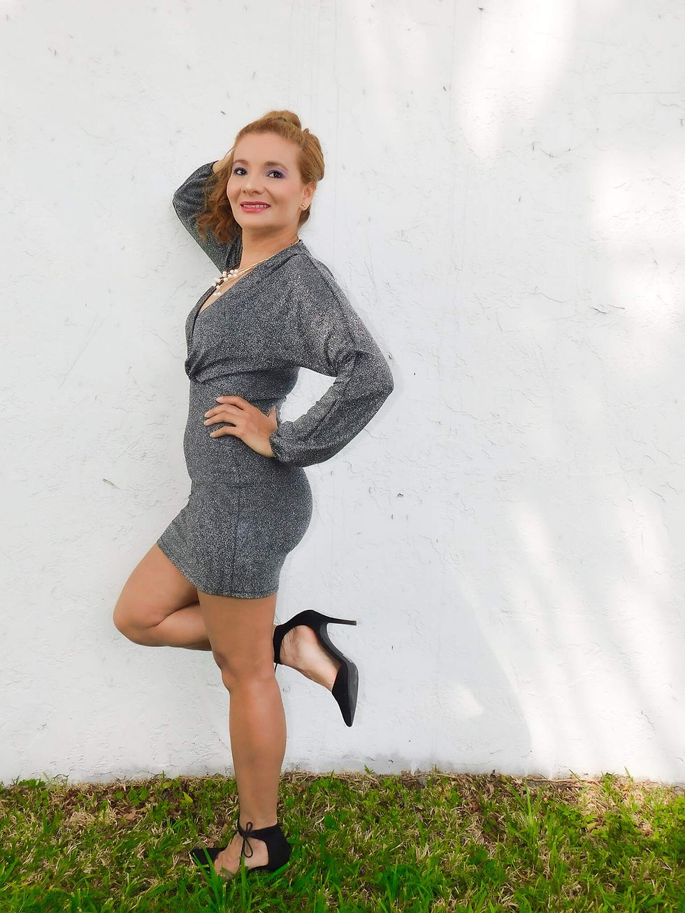Thumbnail: Glamorous long sleeve dress in metallic silver, ideal for evening events