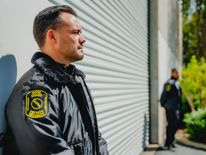 Security guard overseeing access control systems at a high-security facility