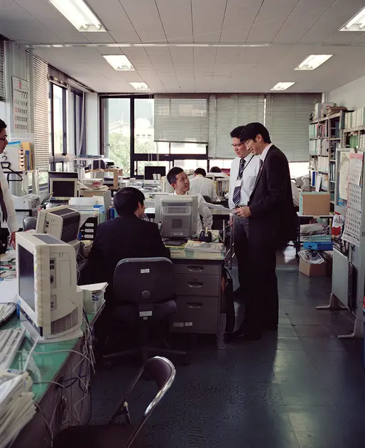 Mayor Tomohisa Taue chatting with members of the press at the kisha club for Monocle magazine photographed by Keith Ng