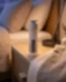 night repair cream on evening bedside table