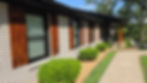 Modern home construction and remodeling with wood shutters