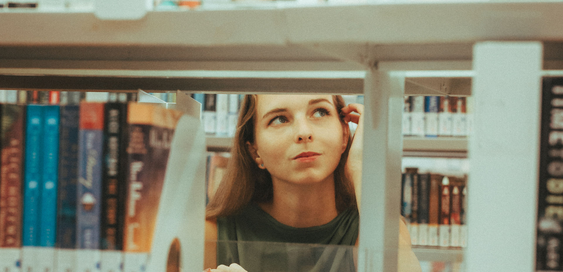 Girl in red photoshoot in public library