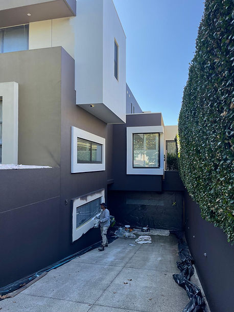 showcasing freshly painted surfaces meeting at sharp, clean lines, reflecting meticulous preparation and workmanship.