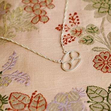 My mothers zodiac sign on her wedding sari.jpeg