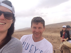 Camel ride in the desert