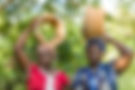 Installers carrying upesi cookstoves for installation