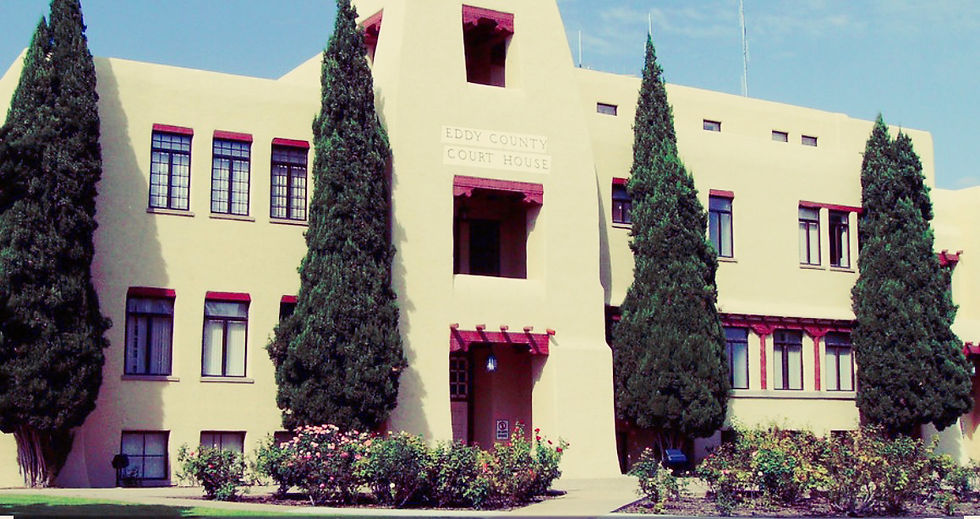 Eye-level view of a courthouse entrance with steps leading up