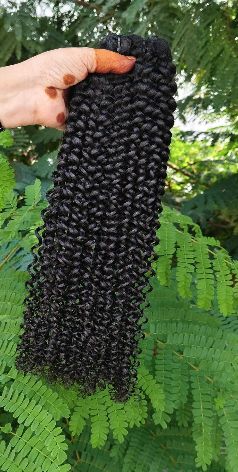 Thumbnail: KINKY WEFTED HUMAN HAIR