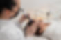 Caucasian girl undergoes scalp treatment to stimulate hair regrowth using microneedling de