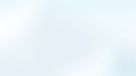 Snow-covered hill with a row of large snowballs rolling down. Bright white and blue tones evoke a serene winter atmosphere.