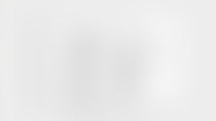 Open book showing "Chapter 1" on a white page with black text. Number "1" is prominent. Pages feature aligned paragraphs. Calm, minimalist setting.