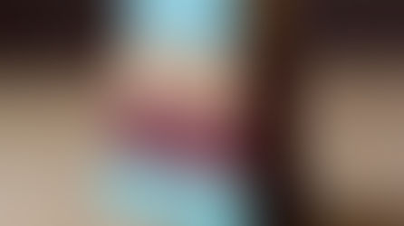 Stack of four building blocks with tan, teal, and maroon accents