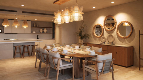 Comedor integrado con cocina abierta en tonos neutros, mesa de madera vestida para varias personas, lámparas de fibra colgantes y mobiliario contemporáneo elegante.