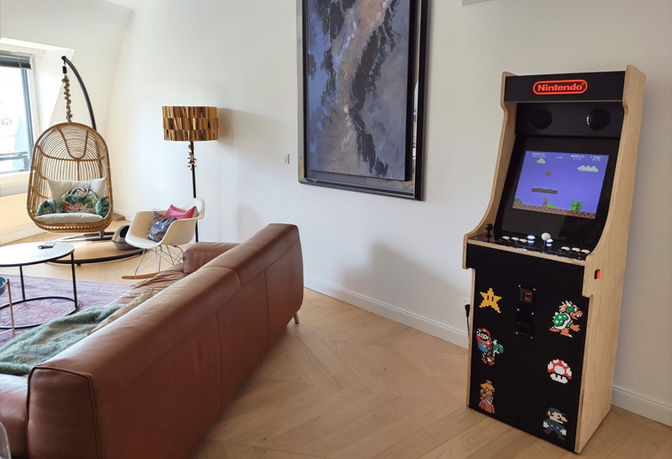 Borne d’arcade avec plus de 3000 jeux intégrés, idéale pour les passionnés de gaming rétro