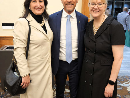 Rhonda Yates, candidate for Michigan House District 55, with Oakland County Executive David Coulter and Melanie Hartman at the Oakland County State of the County.