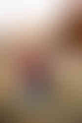 A mother and daughter standing in tall grass during the fall in Niagara.