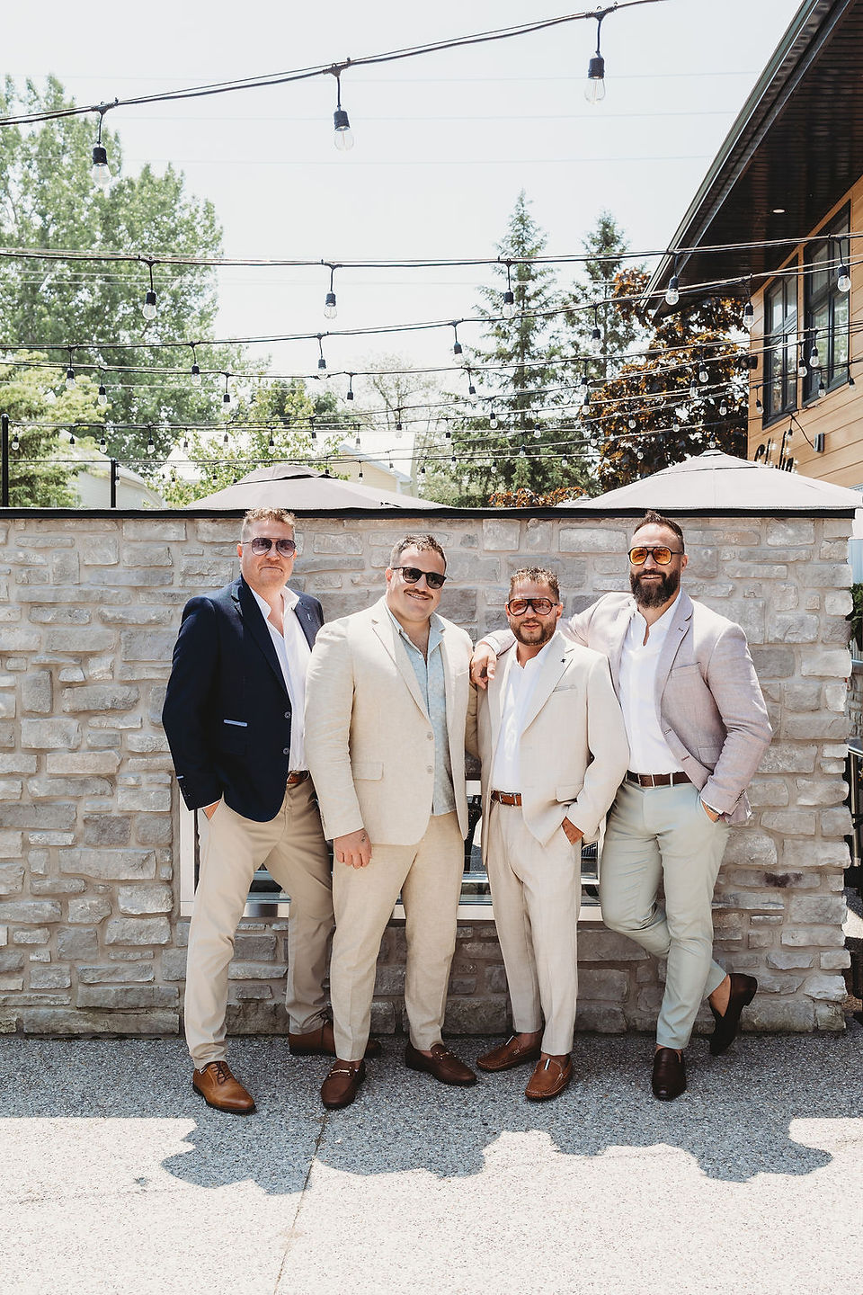 A photo of a groom with his groomsmen