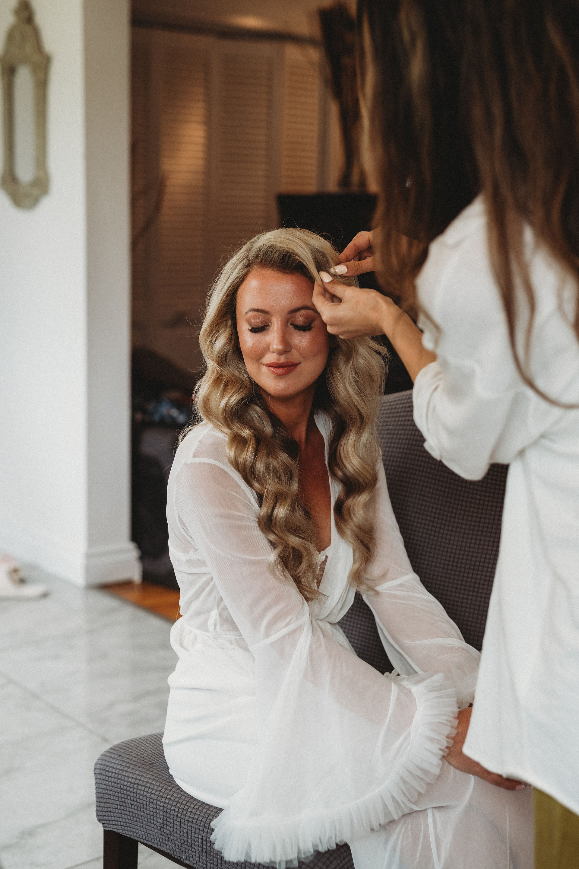 A bride having her hair done in Niagara