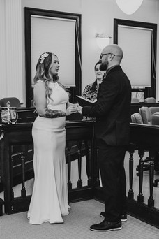 A photo of a couple getting married at the St. Catharine's courthouse