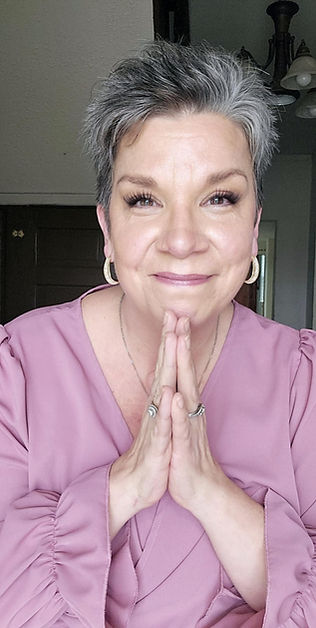 Mauve shirt prayer hands.jpeg