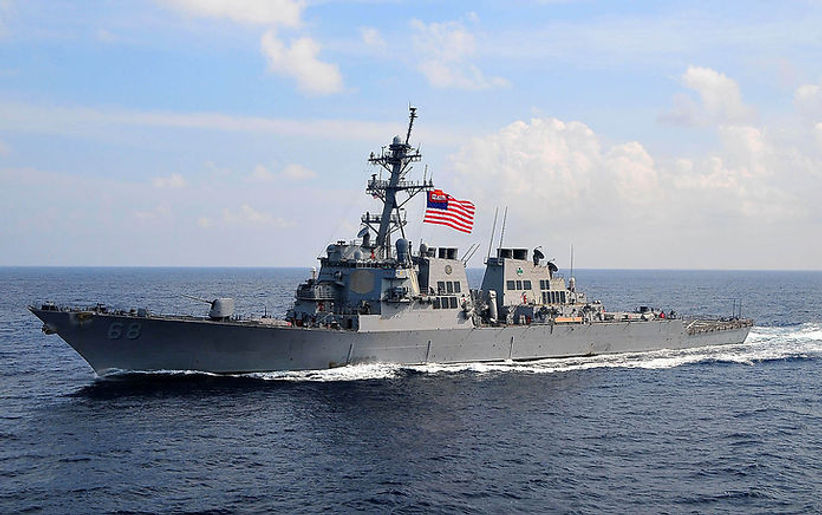 US_Navy_090213-N-4774B-028_The_guided-missile_destroyer_USS_The_Sullivans_(DDG_68)_flies_t