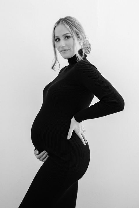 pregnant woman in long black dress, black and white