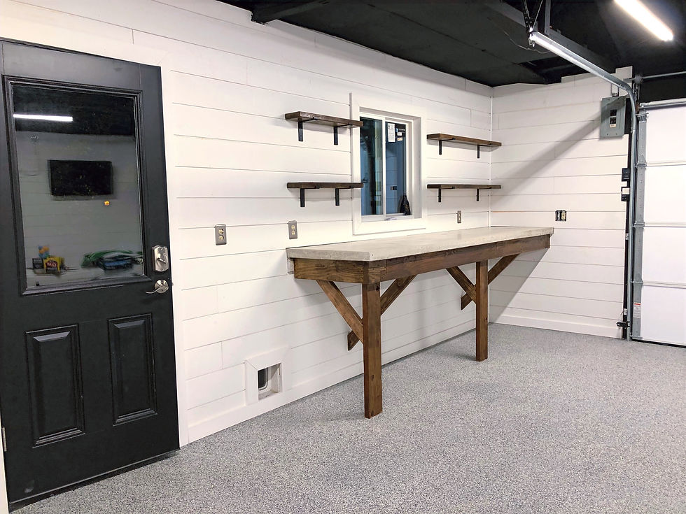 Concrete countertop and shiplap in garage