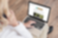 mockup-of-a-woman-working-with-a-macbook-on-her-lap-m13788-r-el2.png