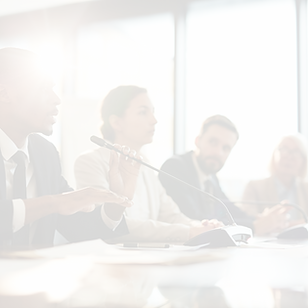 Event conference table talking at a panel.