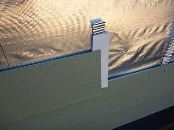 Lap Sidig installed over Roll-On Rainscreen