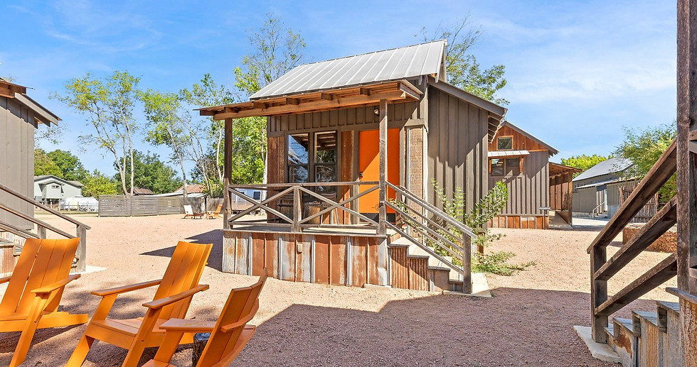 Completed Bunkie project showcasing exterior design and landscaping.