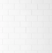 Classic white subway tile backsplash, offering a timeless and clean kitchen aesthetic.