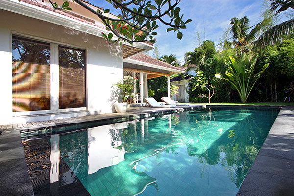Master bedroom overlooks the pool