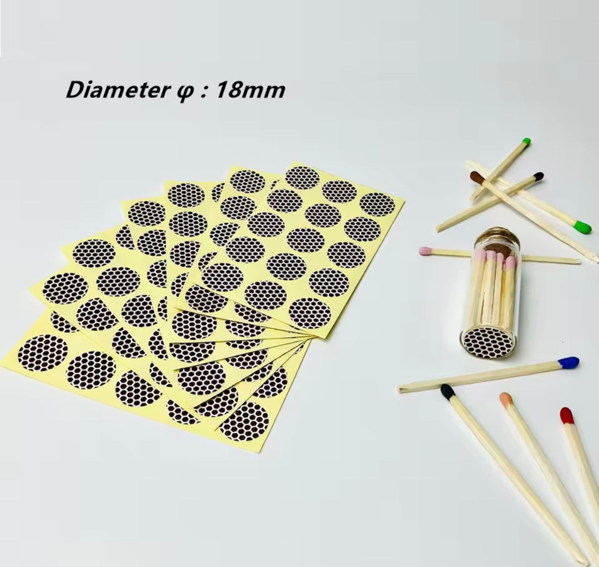 Lija para cerillos en forma circular (15 círculos por hoja.)