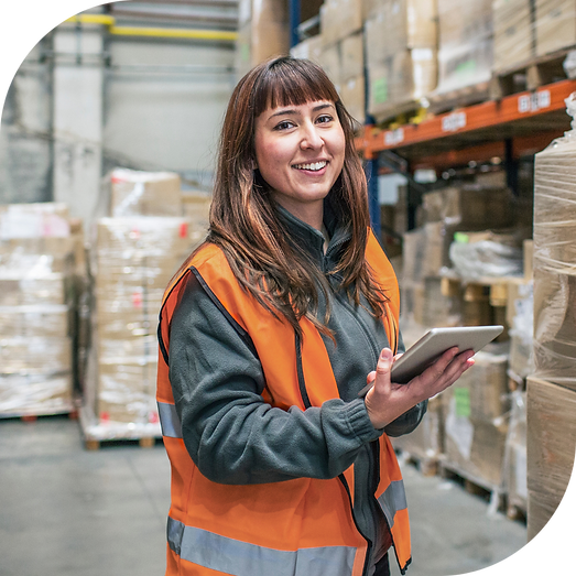 New Zealand manufacturing worker smile while in the warehouse.png